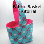 /2013/10/basic_applique_tutorial/_photo_FlutterfromKatprintbranding_Fabricbasketbutton_zpsbb9396b8.png